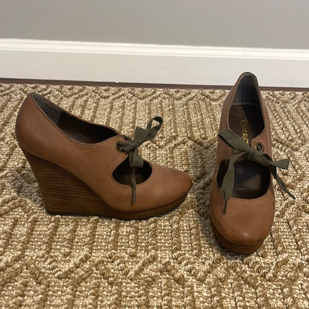 Nude with olive tie wedge pump. Size 6.5.